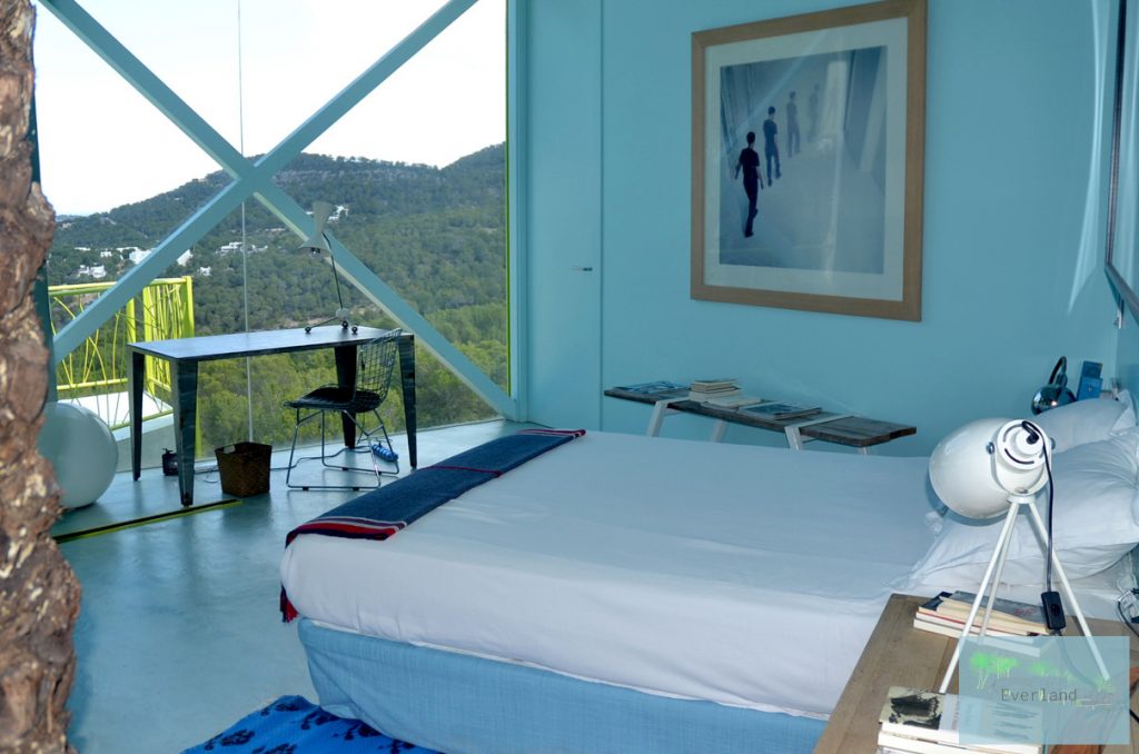 Blue suite bed and view